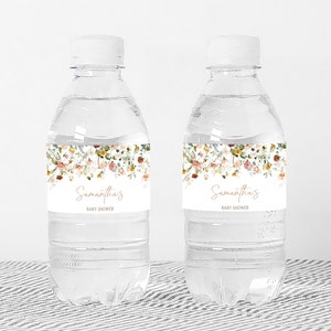a couple of water bottles sitting on top of a table