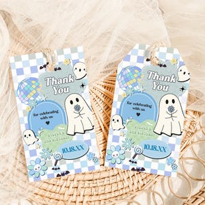 two thank you cards sitting on a basket