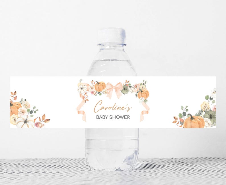 a bottle of water with a baby shower label on it