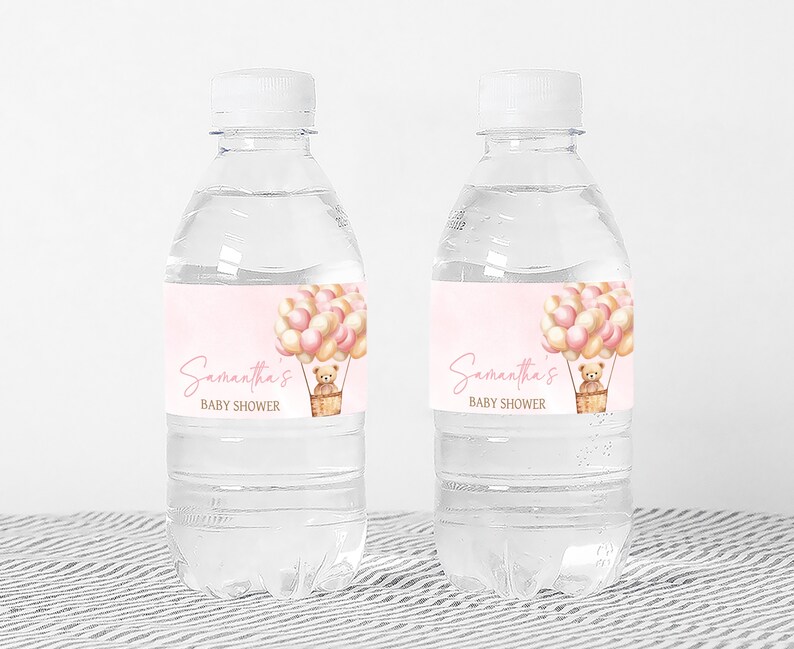 a bottle of water with a label for a baby shower