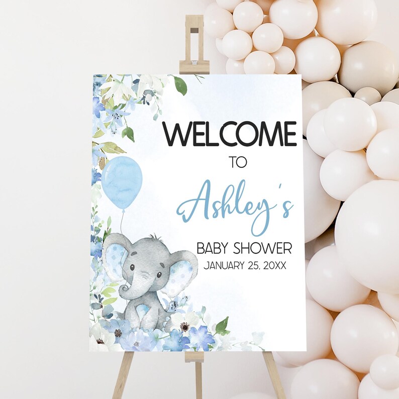 a welcome sign for a baby shower with balloons