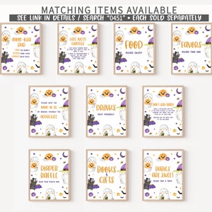 May include: A collection of framed Halloween-themed signs with various phrases and illustrations. Each sign features a cartoon ghost, pumpkin, bat, and witch hat. Text includes "Mom-osa Bar," "Late Night Diapers," and "Food."