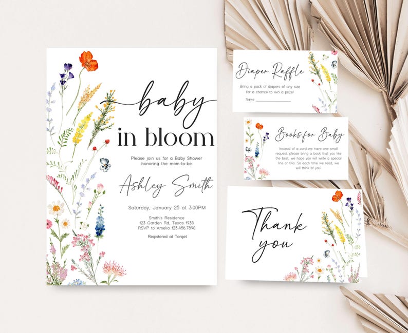 a set of three wedding stationery cards with flowers