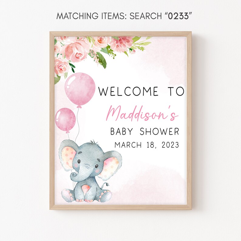 May include: A pink and white baby shower sign with a watercolor illustration of a gray elephant holding pink balloons. The sign says "Welcome to Maddison's Baby Shower March 18, 2023".