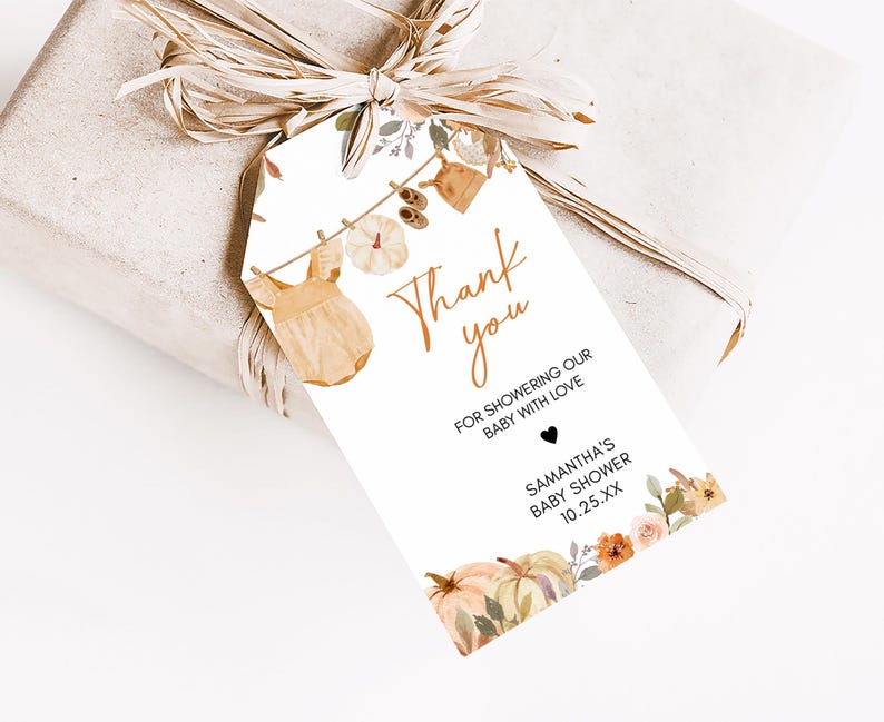 a gift wrapped in brown paper with a tag on it