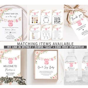 May include: A set of printable baby shower decorations featuring a pink and white floral design with a baby onesie hanging from a clothesline. The set includes a welcome sign, a don't say baby sign, a thank you tag, a water bottle label, and a game card. The text on the welcome sign reads "Welcome to Maddison's Baby Shower April, 20, 20XX". The text on the don't say baby sign reads "Don't Say Baby.  Grab a clothespin and pin it on your clothes. If you hear someone say baby you can steal all of their clothespins. Whoever has the most pins at the end wins!"