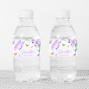 a bottle of water with a butterfly label on it