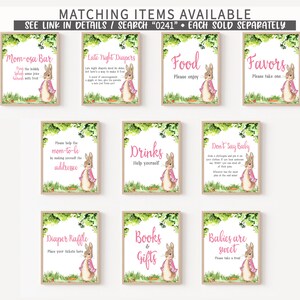 May include: Nine printable signs featuring a watercolor illustration of a rabbit wearing a pink cape. The signs are for a baby shower and include titles like "Mom-osa Bar", "Late Night Diapers", "Food", "Favors", "Drinks", "Don't Say Baby", "Diaper Raffle", "Books & Gifts", and "Babies are Sweet".