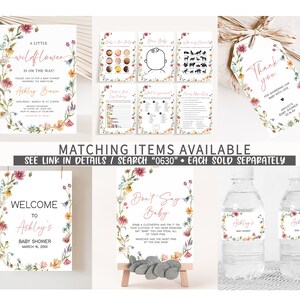 May include: A set of printable baby shower decorations with a floral theme. The decorations include a welcome sign, a don't say baby game, a thank you tag, and water bottle labels. The text on the welcome sign reads "Welcome to Ashley's Baby Shower March 18, 20XX". The text on the don't say baby game reads "Don't Say Baby". The text on the thank you tag reads "Thank you for showering our baby with love Ashley's Baby Shower 05.18". The text on the water bottle labels reads "Ashley's Baby Shower".