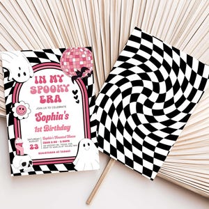 a black and white checkered design with a pink pig on it