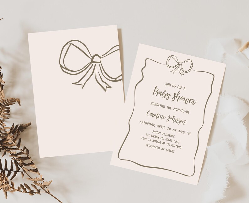 a couple of cards with a bow on them