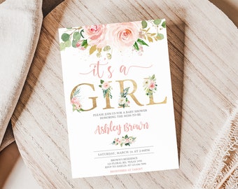 Może przedstawiać: Różowe i złote zaproszenie na baby shower z kwiatowymi akcentami. Zaproszenie zawiera napis "To dziewczynka" i imię "Ashley Brown".