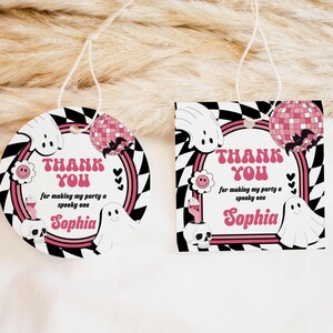 a couple of tags that are on a bed