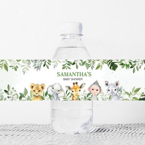 May include: Water bottle label with a green leafy border and a white background. The label features the text "Samantha's Baby Shower" and illustrations of a lion, elephant, giraffe, monkey, and rhinoceros.