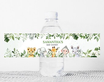 May include: Water bottle label with a green leafy border and a white background. The label features the text "Samantha's Baby Shower" and illustrations of a lion, elephant, giraffe, monkey, and rhinoceros.