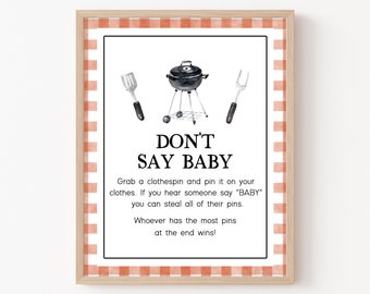 May include: A printable game card with a red and white checkered border. The card has a black and white illustration of a grill and utensils. The text on the card reads "Don't Say Baby. Grab a clothespin and pin it on your clothes. If you hear someone say "Baby" you can steal all of their pins. Whoever has the most pins at the end wins!"