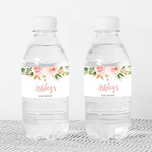 a couple of water bottles sitting on top of a table