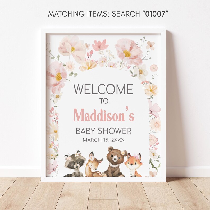 a picture of a baby shower sign on a wall