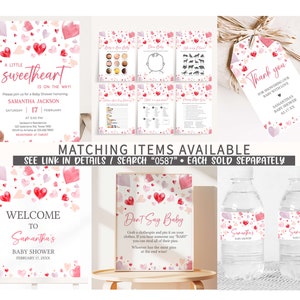 May include: A set of printable baby shower decorations with a pink and red watercolor heart pattern. The set includes a welcome sign, a don't say baby game, a water bottle label, and a thank you tag. The text on the welcome sign reads "Welcome to Samantha's Baby Shower February 17, 20XX". The text on the don't say baby game reads "Don't Say Baby Grab a clothespin and pin it on your clothes. If you hear someone say "BABY" you can steal all of their pins. Whoever has the most pins at the end wins!"