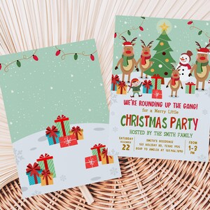 two christmas party cards sitting on top of a wicker basket