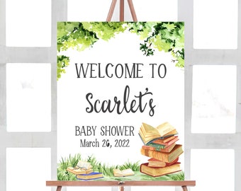 May include: Welcome to Scarlet's Baby Shower sign with a watercolor green leafy border and a stack of books with a date of March 26, 2022.