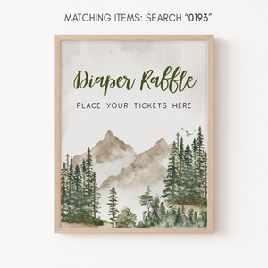 May include: A printable sign for a diaper raffle with a watercolour illustration of mountains and trees. The sign says "Diaper Raffle" and "Place your tickets here".