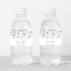 a couple of water bottles sitting on top of a table