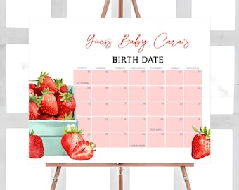 May include: A pink and white calendar with the text "Guess Baby Cara's Birth Date" at the top. The calendar is decorated with red strawberries and a blue box.