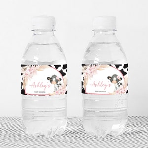 a couple of water bottles sitting on top of a table