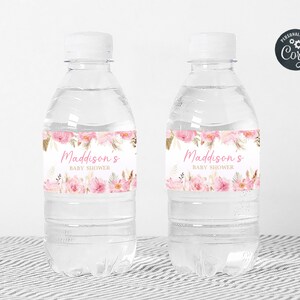 May include: Two clear plastic water bottles with pink floral labels that say "Maddison's Baby Shower".