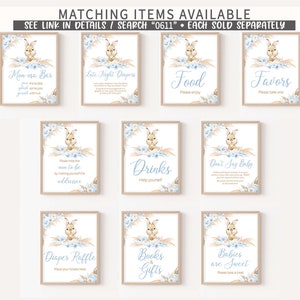 May include: Nine printable signs for a baby shower with a blue and brown color scheme. The signs feature a cute bunny rabbit illustration and text that says "Mom-osa Bar", "Late Night Diapers", "Food", "Favors", "Drinks", "Don't Say Baby", "Diaper Raffle", "Books & Gifts", and "Babies are Sweet".