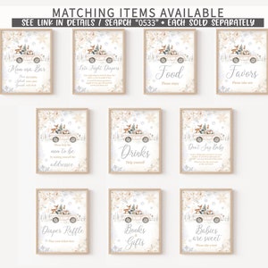 May include: A collection of framed signs with a winter theme. Each sign features a vintage truck illustration with woodland animals and text such as "Mom esa Bar", "Late Night Diapers", "Food", and "Favors". The signs are decorated with snowflakes.