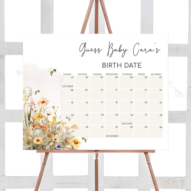 an easel with a calendar on top of it