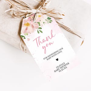 a gift wrapped in paper and tied with a ribbon