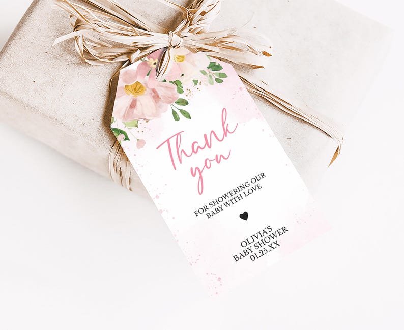 a gift wrapped in paper and tied with a ribbon