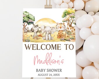 May include: Welcome to Madison's Baby Shower sign with a watercolor illustration of a giraffe, zebra, elephant, and tiger in a jungle setting. The sign is white with brown text and a pink name.