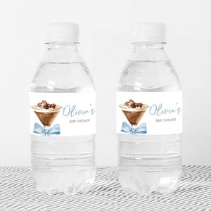 two bottles of water with a label on them