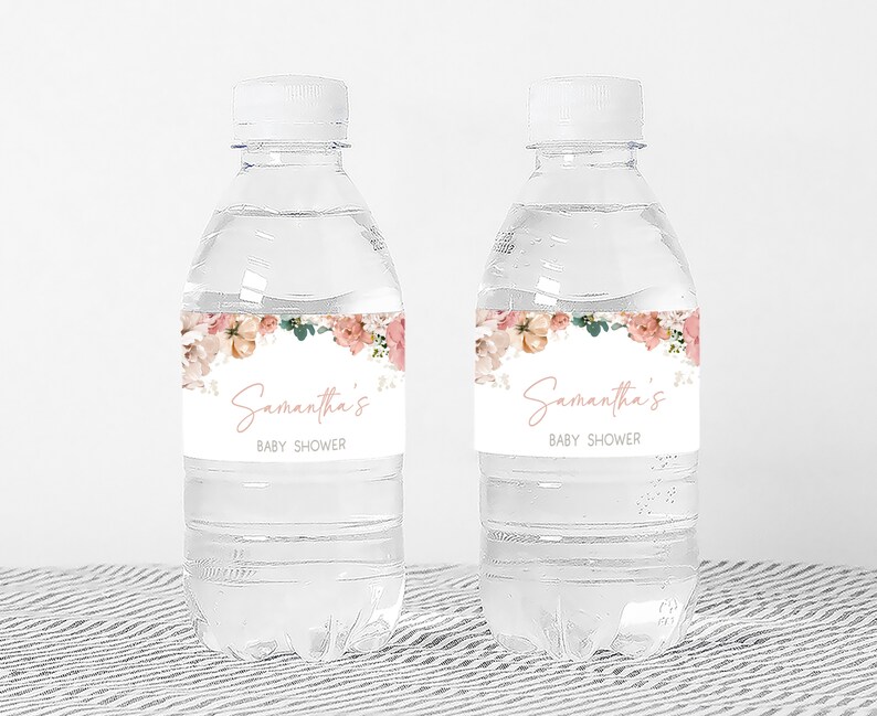 a bottle of water with a label for a baby shower