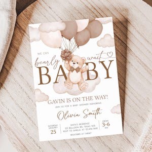 a baby shower card with a teddy bear on it