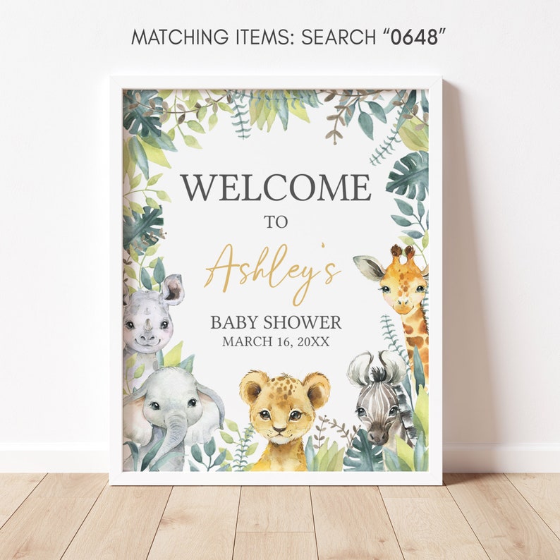 Puede incluir: Un cartel de bienvenida a la fiesta de bienvenida al beb&eacute; de Ashley con un tema de selva. El cartel presenta una jirafa, un le&oacute;n, una cebra, un elefante y un rinoceronte. El texto en el cartel dice "Bienvenido a la fiesta de bienvenida al beb&eacute; de Ashley 16 de marzo de 20XX".