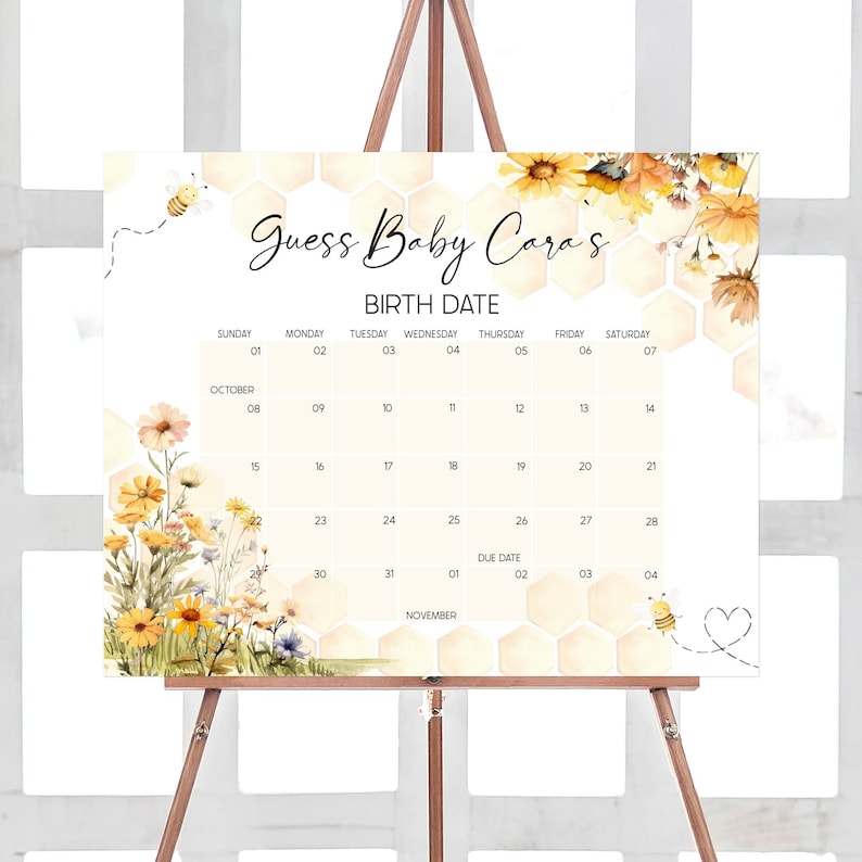 a calendar on a easel with flowers on it