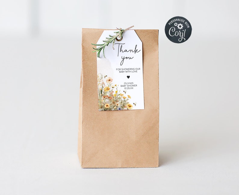 a brown paper bag with a thank you tag on it
