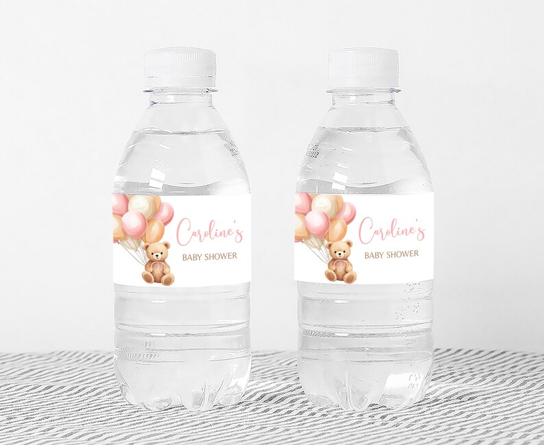 a bottle of water with a teddy bear on it