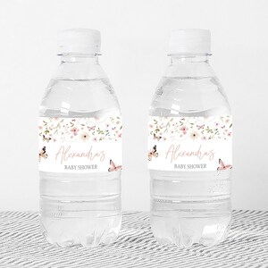 a couple of water bottles sitting on top of a table