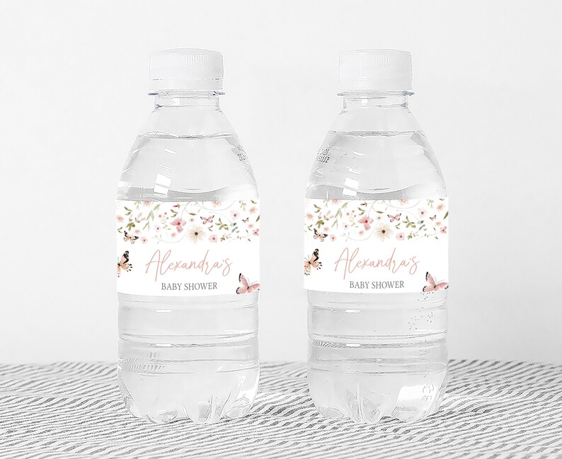 a couple of water bottles sitting on top of a table