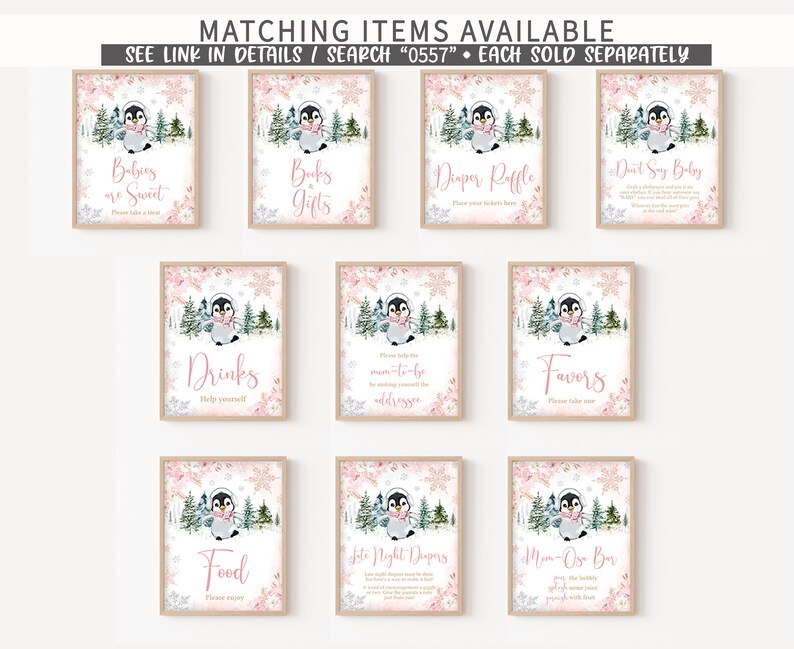 May include: A collection of framed signs with a winter penguin theme. Each sign features a watercolor penguin in a scarf, surrounded by snowflakes and floral accents. Text includes "Babies are Sweet", "Books & Gifts", and "Diaper Raffle".