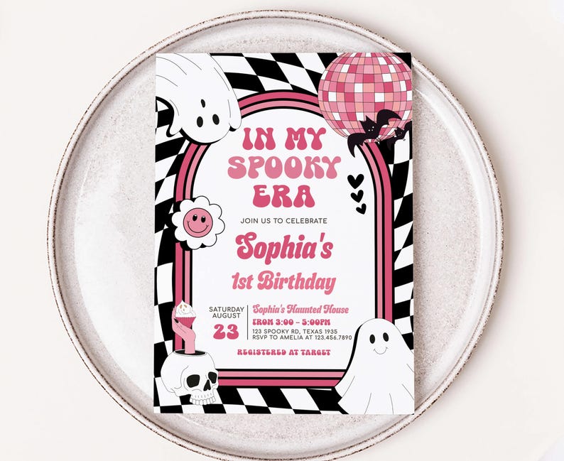 a pink and black birthday party card on a plate