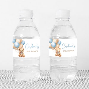 a bottle of water with a teddy bear on it