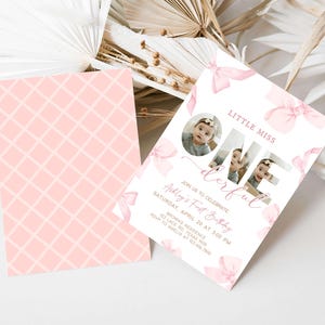 a photo of a baby girl on a pink and white card