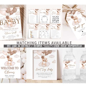 a set of baby shower items including a bottle of water